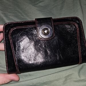 Black Wilson's Leather Wallet with Button Closure